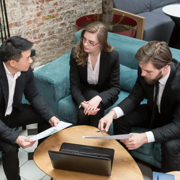 three-multiethnic-businessmen-consider-business-contract-offer-field-it-technologies-provision-legal-c three-multiethnic-businessmen-consider-business-contract-offer-field-it-technologies-provision-legal-c
